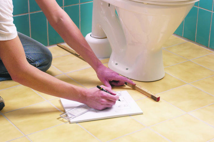 When to install the toilet - before or after tiling