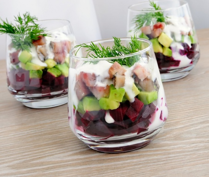 Appetizer with caviar, beetroot and avocado