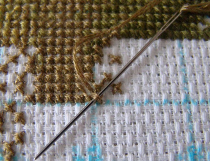 How to fix a thread when embroidering a cross