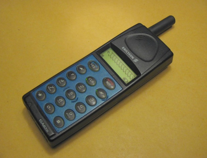 Mobile phone, released before 2003. In his IMEI you can find out the country of origin.